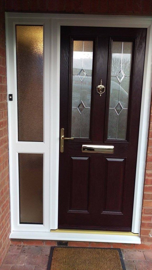 Modern composite door with sleek handles - Highlights the door's style and hardware.