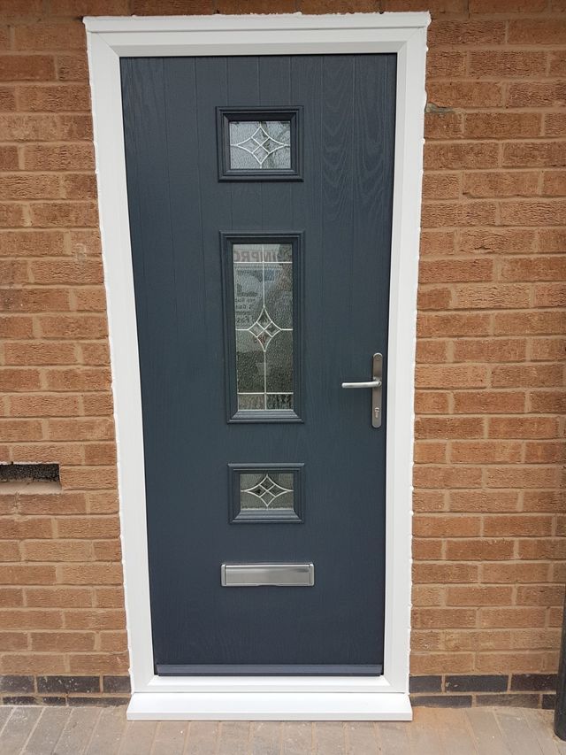 composite door with Georgian-style glass - Detailed description of color and glass design.